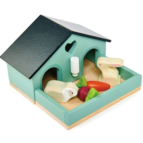 Tender Leaf Toys houten konijnenhok voor poppenhuisdieren met twee konijnen en groenten.
