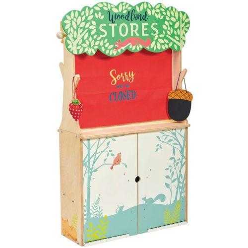 Het Tender Leaf Toys houten winkeltje, gesloten met een rood gordijn waarop 'Sorry we're CLOSED' staat.