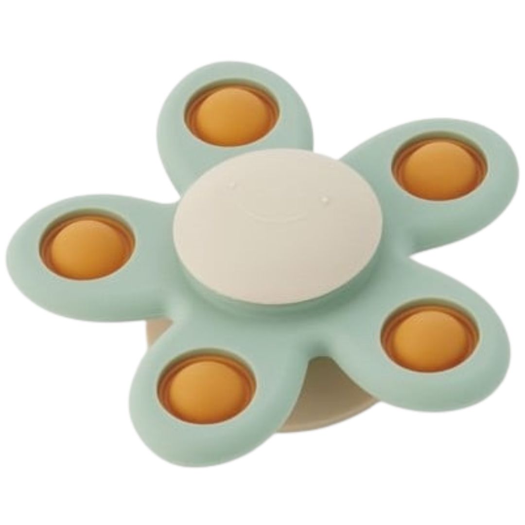 tickit silisoft babyspeelgoed fidget spinner in de vorm van een groene bloem met oranje pop-it knoppen.