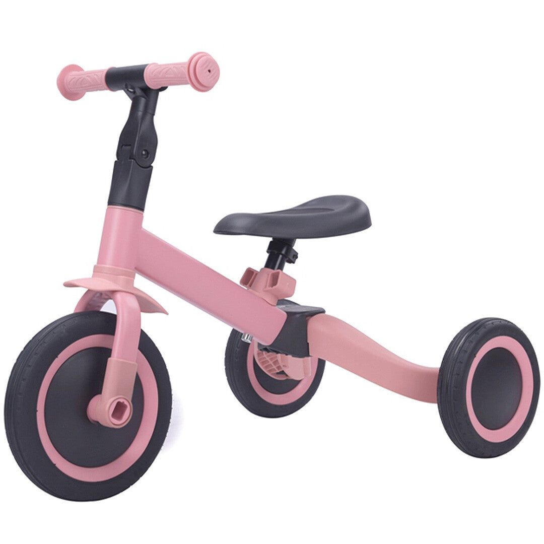 Topmark 4-in-1 roze driewieler zonder pedalen, schuin van voren gefotografeerd.