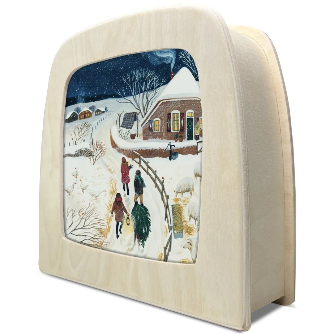 Toverlux toverlamp met de toverplaat van een besneeuwd winterlandschap met een boerderij en figuren.