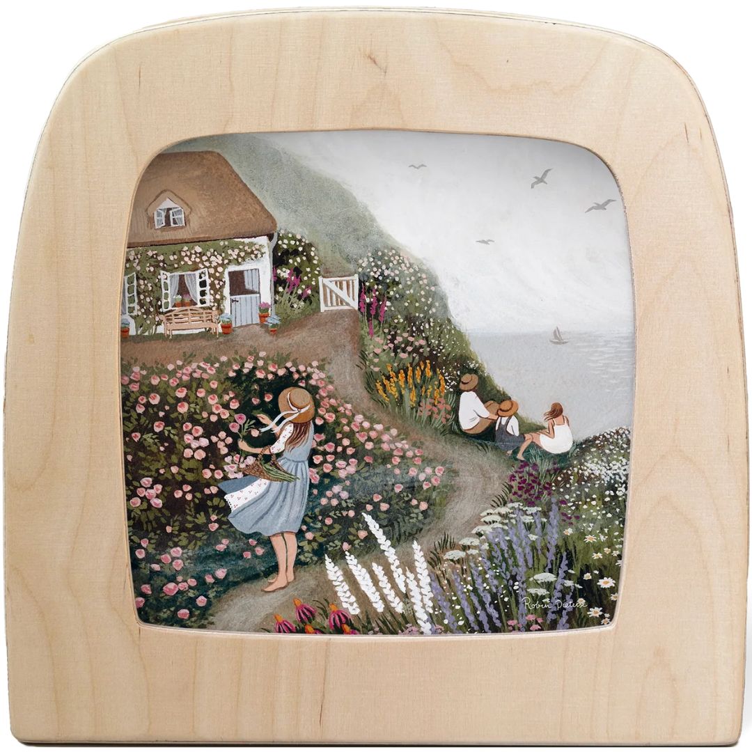 Vooraanzicht van de Toverlux toverplaat 'rozenhuisje' in een houten toverlamp.