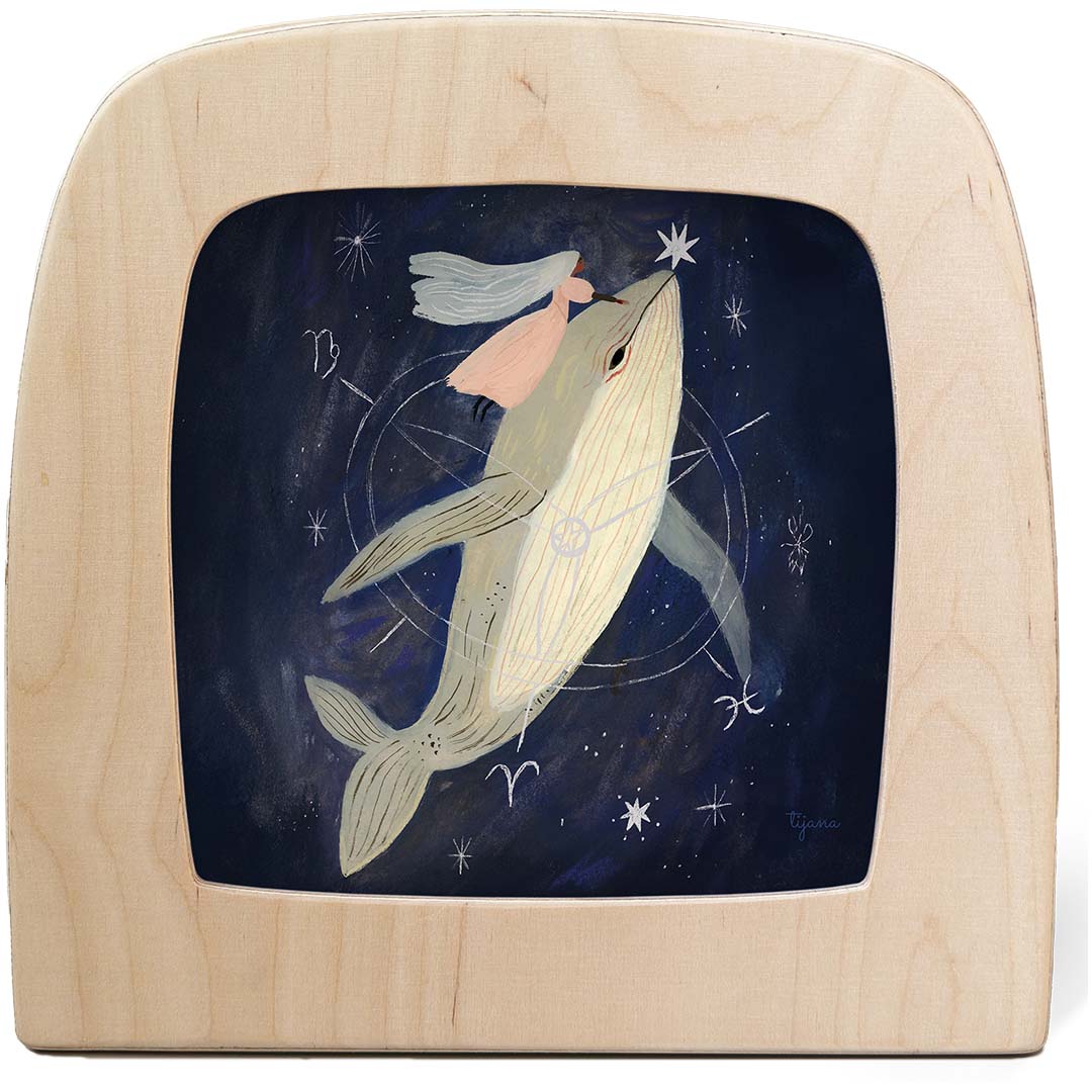 Vooraanzicht van de Toverlux toverlamp met de walvis toverplaat, met een illustratie van een walvis en sterren.
