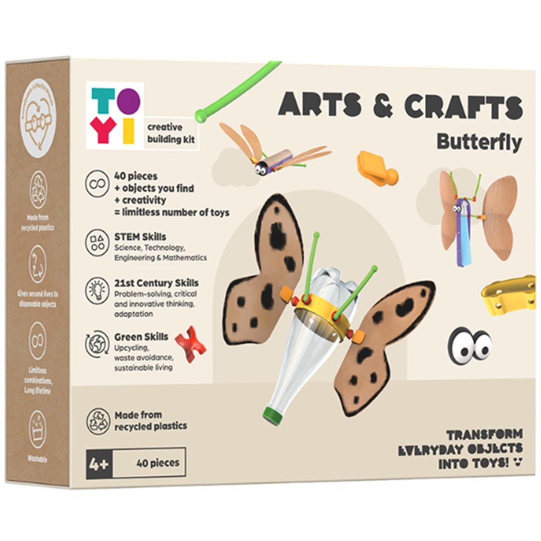 De verpakking van het TOYI Arts & Crafts Butterfly bouwpakket, met voorbeelden van vlinders gemaakt van gerecyclede materialen en plastic onderdelen.