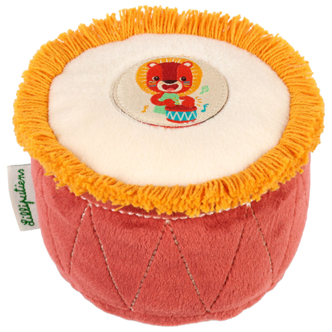 Lilliputiens babyspeelgoed rammelaar in de vorm van een oranje trommel met een leeuw erop.