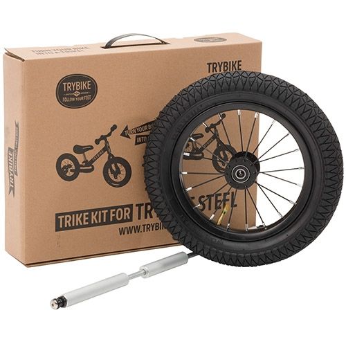 Trybike trike kit verpakking met een los zwart wiel en een zilveren as.