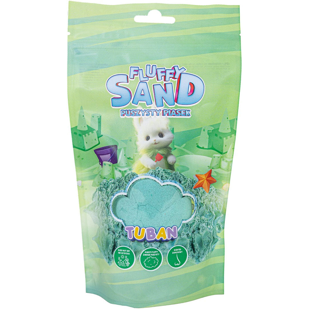 Voorkant van de Tuban Fluffy Sand verpakking met groen kinetisch zand, een wit katje en zandkastelen.