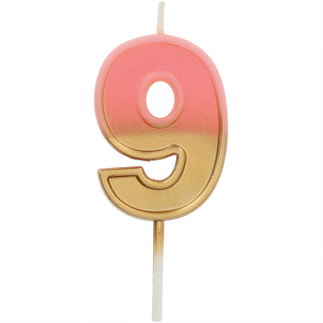 Roze gouden verjaardagskaars in de vorm van het cijfer 9.