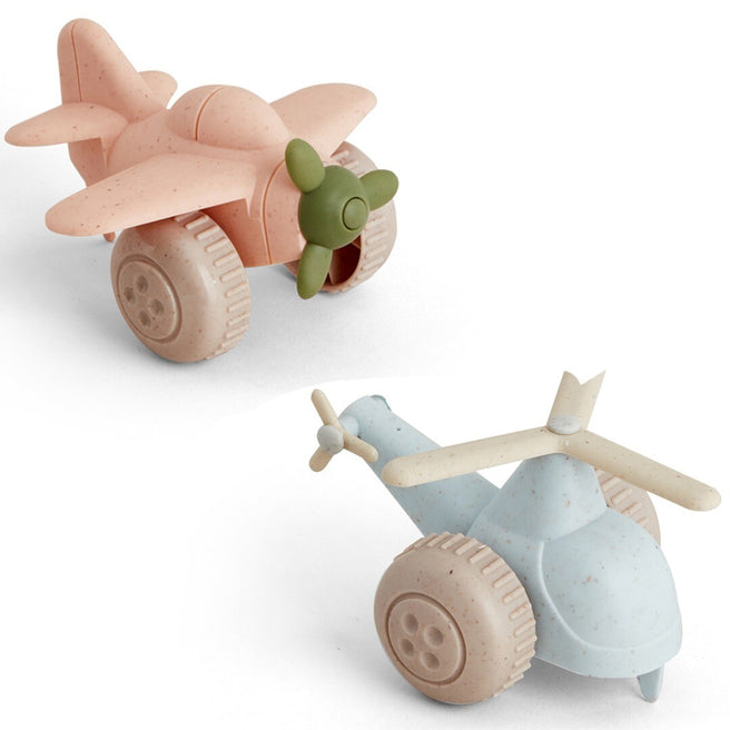 Viking Toys plastic speelgoedvliegtuig en helikopter in roze en lichtblauw.