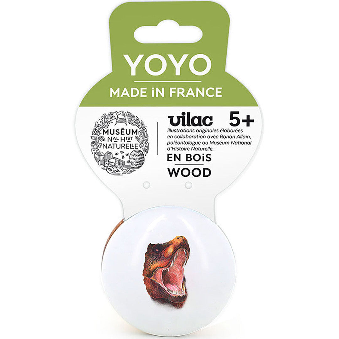 De Vilac jojo met T-rex illustratie in de groene en witte verpakking.