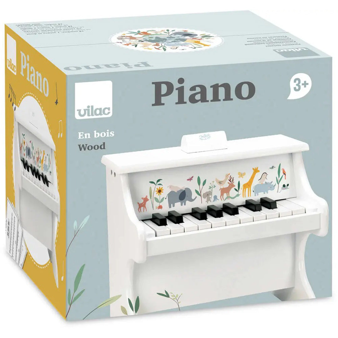 De verpakking van de Vilac houten speelgoedpiano met een afbeelding van het product en de tekst 'Piano'.