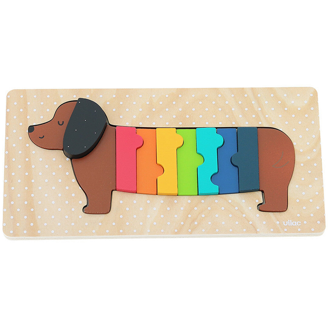 Vilac houten teckel puzzel voor peuters met alle kleurrijke stukken in elkaar gezet.