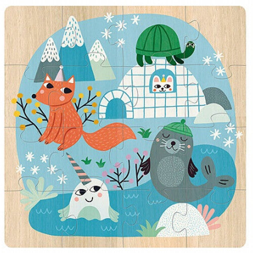 Een voltooide Vilac houten puzzel met arctische dieren zoals een vos, narwal, zeehond en schildpad bij een iglo.
