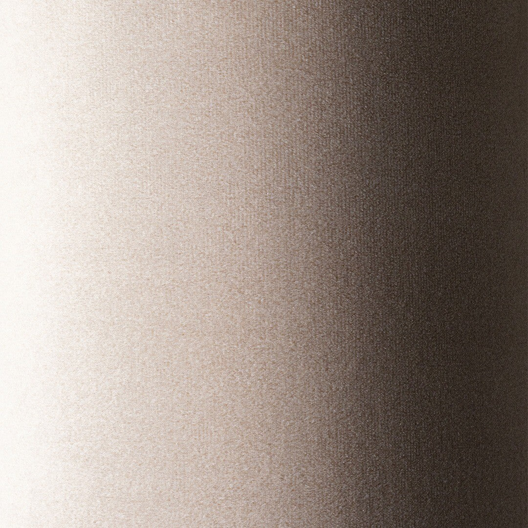 Detail van de beige fluwelen stof van de zitzak.
