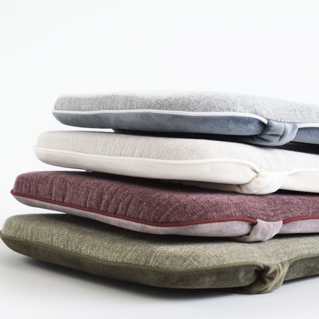 Stapel Wobbel matrassen in verschillende kleuren.