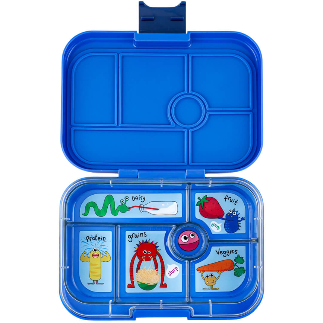 Yumbox broodtrommel met 6 vakken en grappige monster illustraties voor verschillende voedselgroepen.