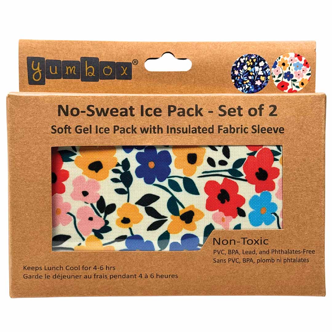 De voorkant van de Yumbox verpakking voor twee koelelementen, met een bloemenpatroon zichtbaar door het venster.