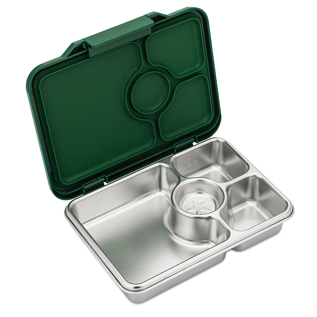 Yumbox rvs bento broodtrommel voor kinderen, schuin open met vier vakken en een sterrenpatroon in het midden.