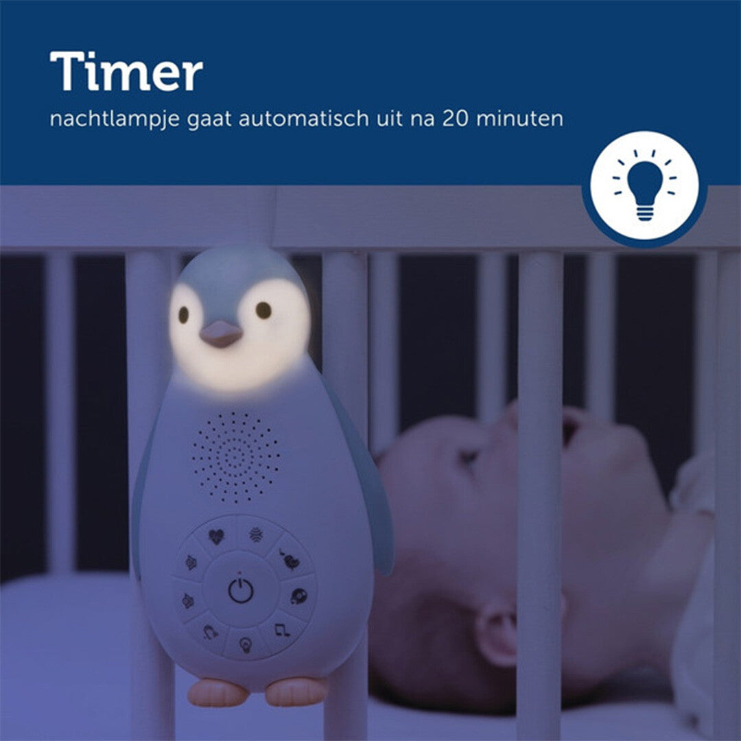 Infographic van het Zazu pinguïn nachtlampje dat zachtjes gloeit aan een wiegje, met de tekst 'Timer' en 'nachtlampje gaat automatisch uit na 20 minuten'.